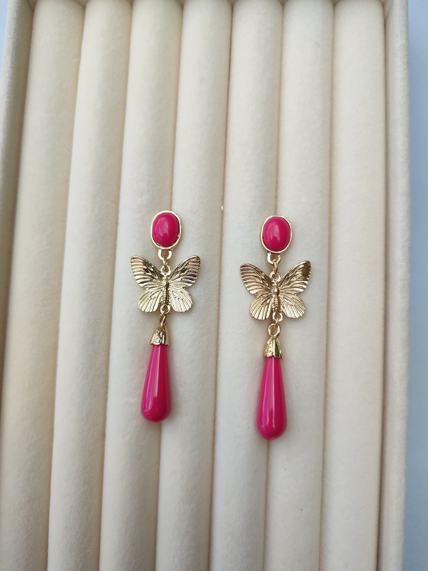 Pendientes mariposa fucsia