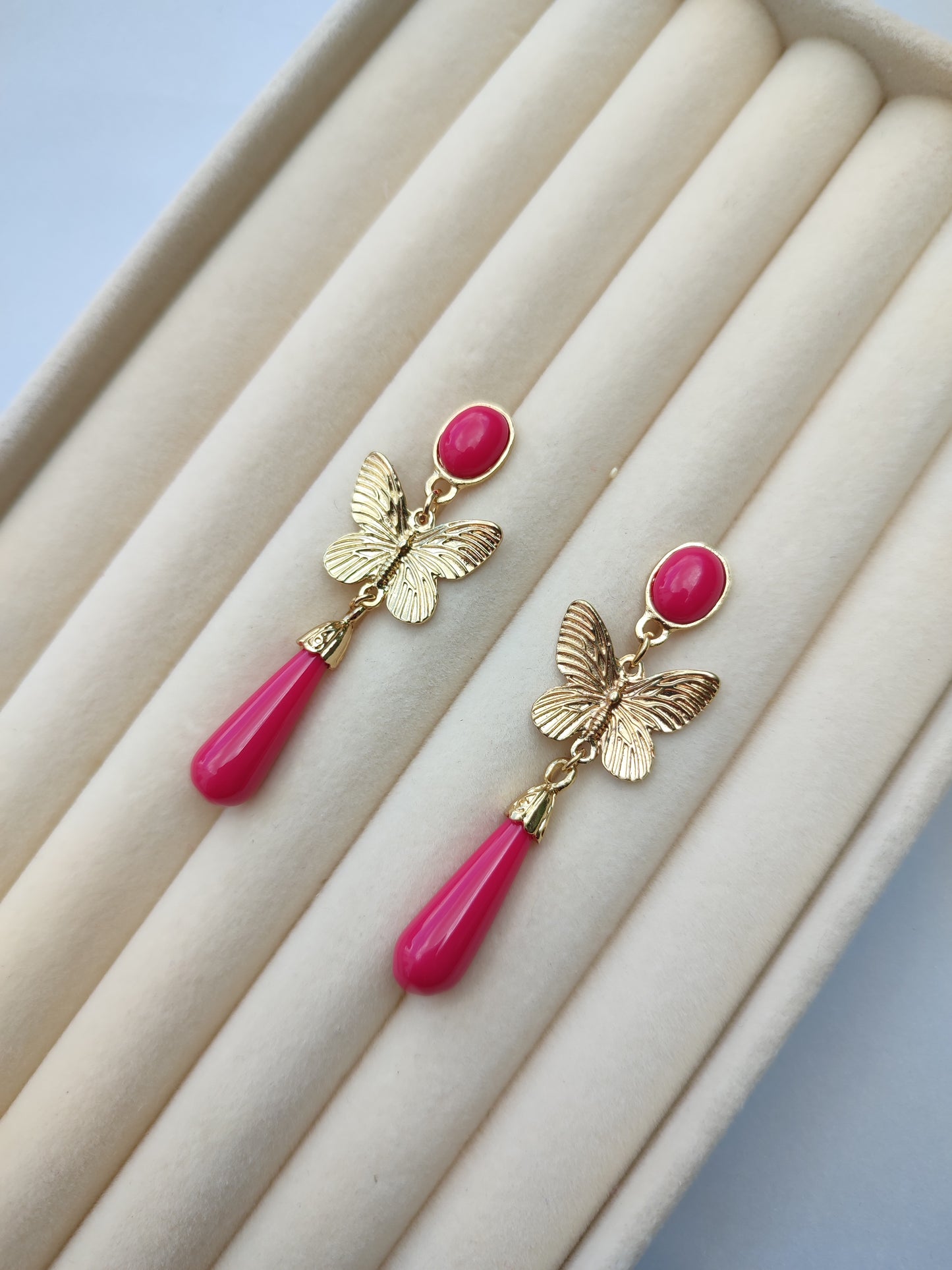 Pendientes mariposa fucsia