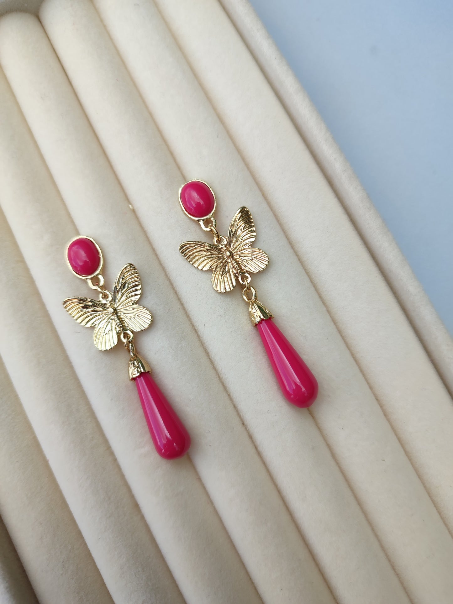 Pendientes mariposa fucsia