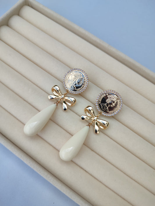 Pendientes moneda beige