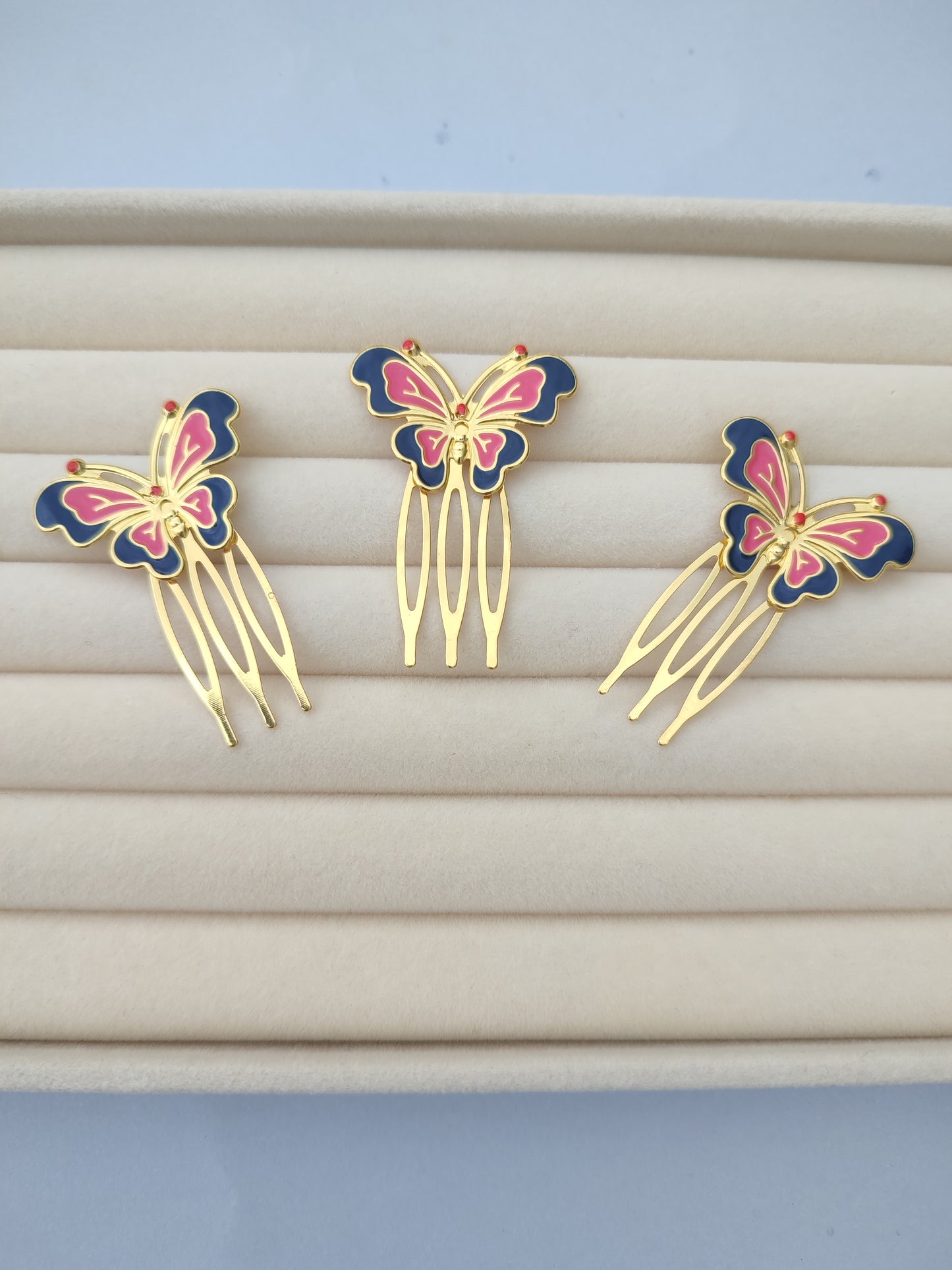 Peina mariposa rosa